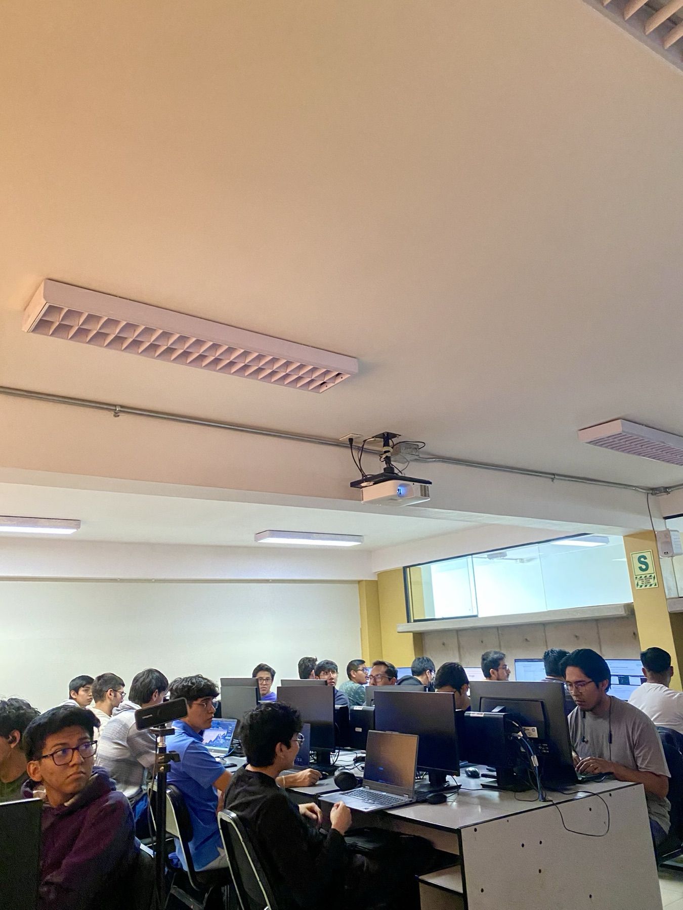 Students attending a GitHub Fest Arequipa session